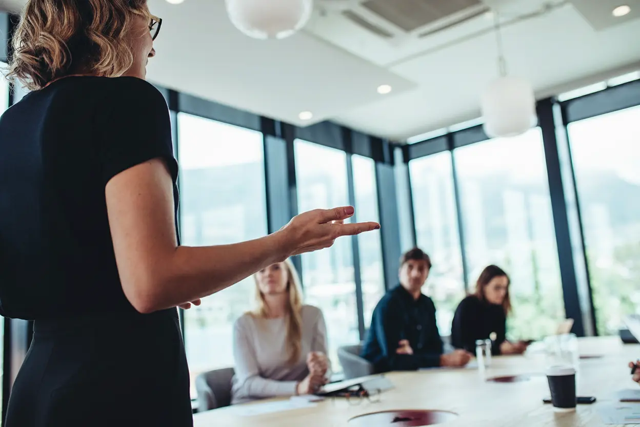 Businesswoman making a presentation to her colleagues in office